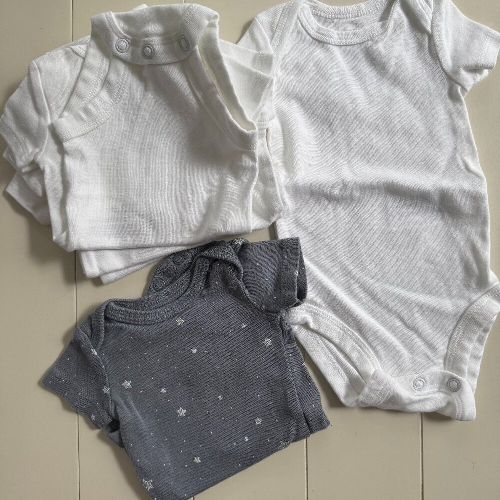 5 Newborn Onesies - never worn!